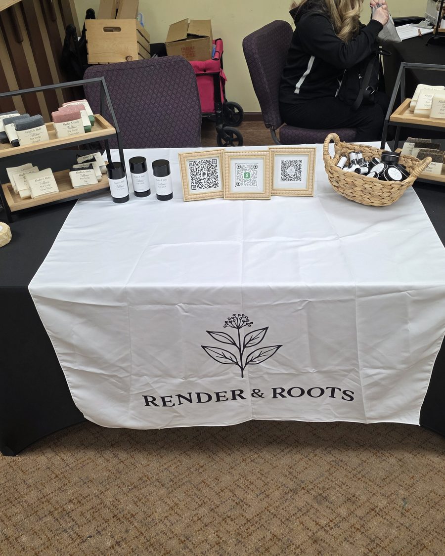 Render & Roots handcrafted tallow products at a local farmers market booth